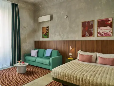 Letto o letti in una camera di Numa Florence Rodo