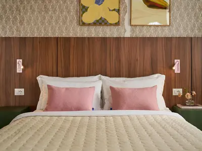 Letto o letti in una camera di Numa Florence Rodo