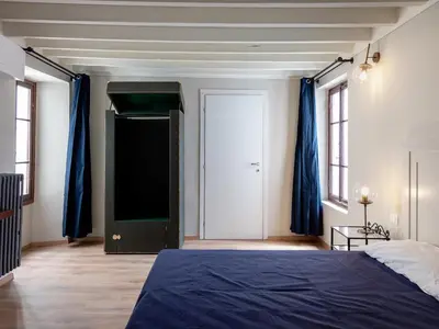 Letto o letti in una camera di B&B Stupido Hotel