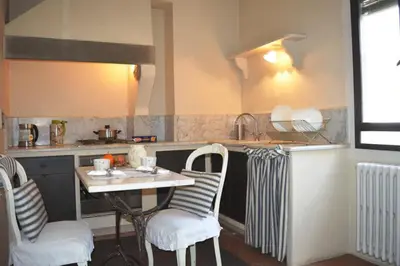 Cucina o angolo cottura di Panoramic Suite near Duomo and Station
