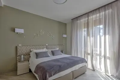 Letto o letti in una camera di La perla di San Frediano
