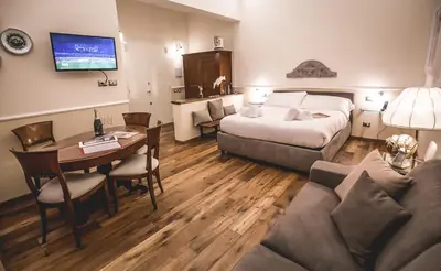 Letto o letti in una camera di Acacia Firenze -Timo
