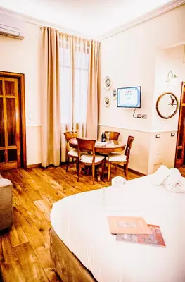Letto o letti in una camera di Acacia Firenze -Timo