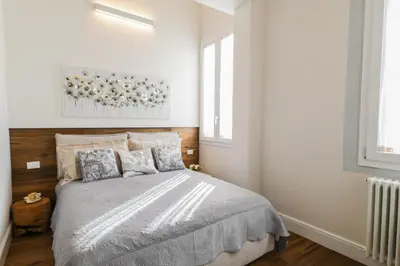 Letto o letti in una camera di Oltrarno Lily Suite