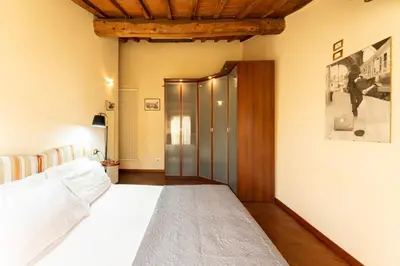 Letto o letti in una camera di Attico Amorino