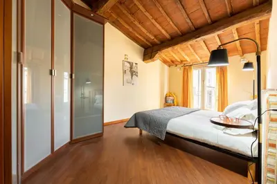 Letto o letti in una camera di Attico Amorino