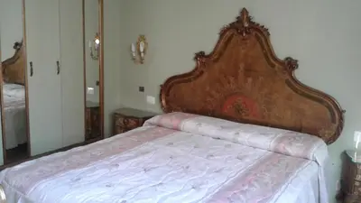 Letto o letti in una camera di La dimora del pittore