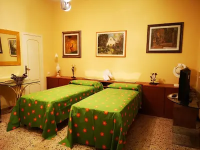 Letto o letti in una camera di La dimora del pittore