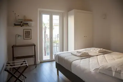 Letto o letti in una camera di Pietrapiana Boutique Apartments
