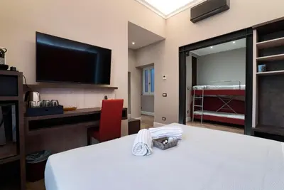 Letto o letti in una camera di Artemide Guest House