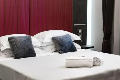 Letto o letti in una camera di Artemide Guest House