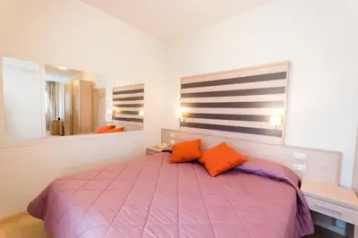 Letto o letti in una camera di Stilhotel