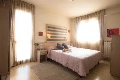 Letto o letti in una camera di Stilhotel