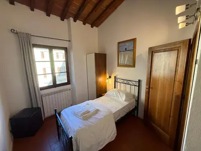 Letto o letti in una camera di Domus Plaza