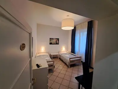Letto o letti in una camera di New Sweet Florence