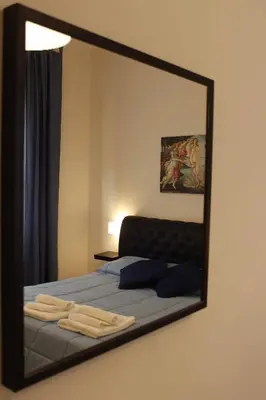 Letto o letti in una camera di New Sweet Florence