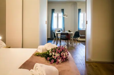 Letto o letti in una camera di Acacia Firenze - Dalia