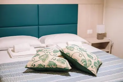 Letto o letti in una camera di Appartamento la Ninfea