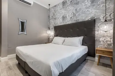 Letto o letti in una camera di Bell Tower Apartments with View