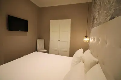 Letto o letti in una camera di Bell Tower Studio Apartment