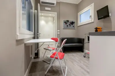 TV o dispositivi per l'intrattenimento presso Bell Tower Studio Apartment