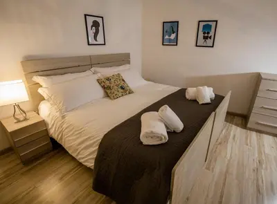 Letto o letti in una camera di Acacia Firenze - Calla