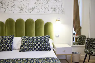 Letto o letti in una camera di Stanze del David Place