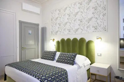 Letto o letti in una camera di Stanze del David Place
