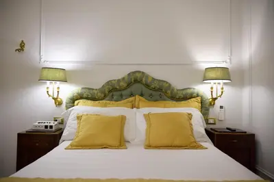 Letto o letti in una camera di Stanze del David Place