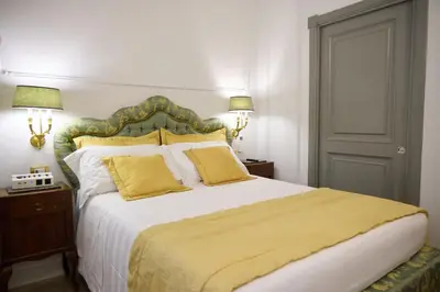 Letto o letti in una camera di Stanze del David Place