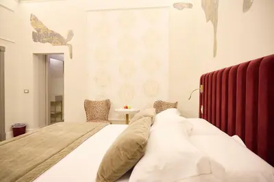 Letto o letti in una camera di Stanze del David Place