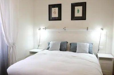 Letto o letti in una camera di Delizioso Bilocale Fiorentino