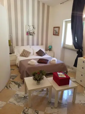 Letto o letti in una camera di Raffaello al Duomo by Charming Italy Tour