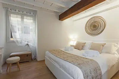 Letto o letti in una camera di Tornabuoni - Flo Apartments centro storico