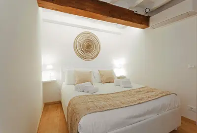 Letto o letti in una camera di Tornabuoni - Flo Apartments centro storico