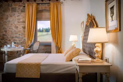 Letto o letti in una camera di Agri Resort & SPA Le Colline del Paradiso