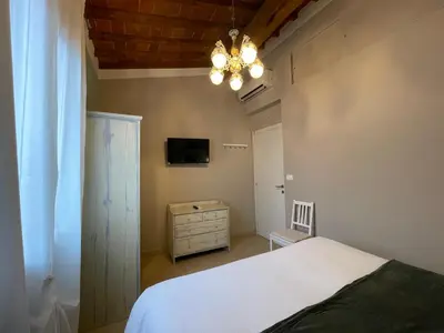 Letto o letti in una camera di Appartamento Orchidea