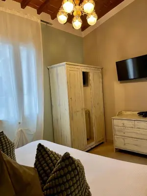 Letto o letti in una camera di Appartamento Orchidea