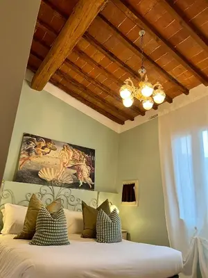 Letto o letti in una camera di Appartamento Orchidea