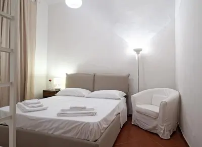 Letto o letti in una camera di Mosca Cieca