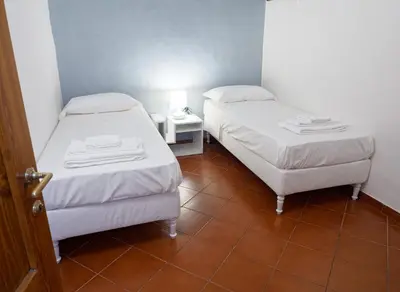 Letto o letti in una camera di Mosca Cieca