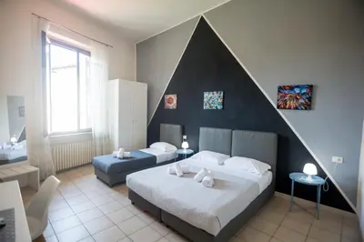 Letto o letti in una camera di Villa Gelsomino Garden