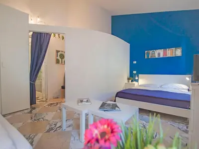 Letto o letti in una camera di Apartment Bufalini 2 - Raffaello by Interhome