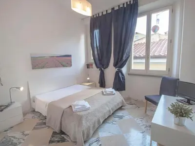 Letto o letti in una camera di Apartment Bufalini 3 - Michelangelo by Interhome