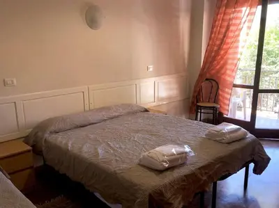 Letto o letti in una camera di Sansovino Bed and Car