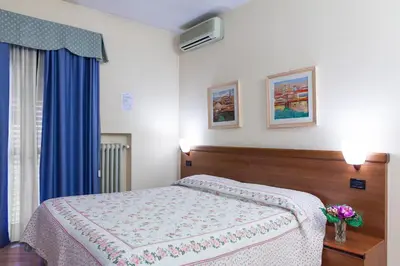 Letto o letti in una camera di Hotel San Marco