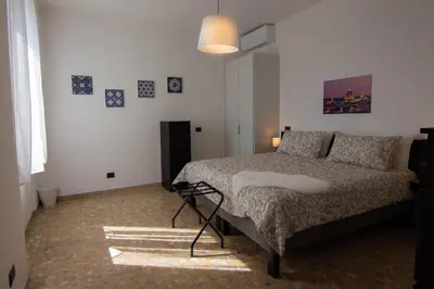 Letto o letti in una camera di Kate Apartment in centro 3 camere da letto 3 bagni