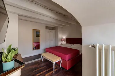 Letto o letti in una camera di Residenza d'Epoca Sant Egidio