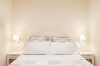 Letto o letti in una camera di Dimora Sant'Orsola