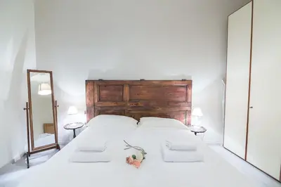 Letto o letti in una camera di Pontormo by Mmega